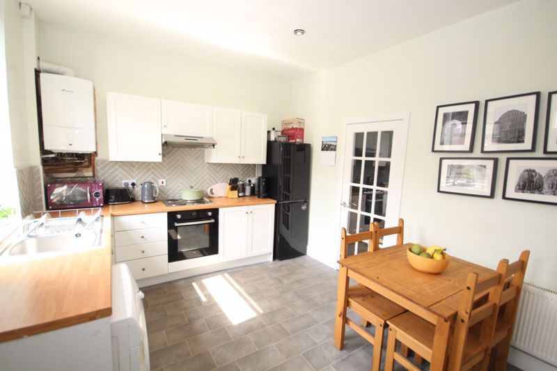 Property photo 3 of 15 Dining Kitchen