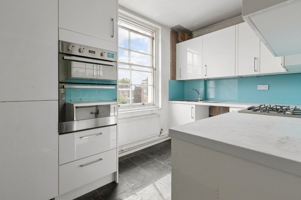 Property photo 3 of 12 Kitchen