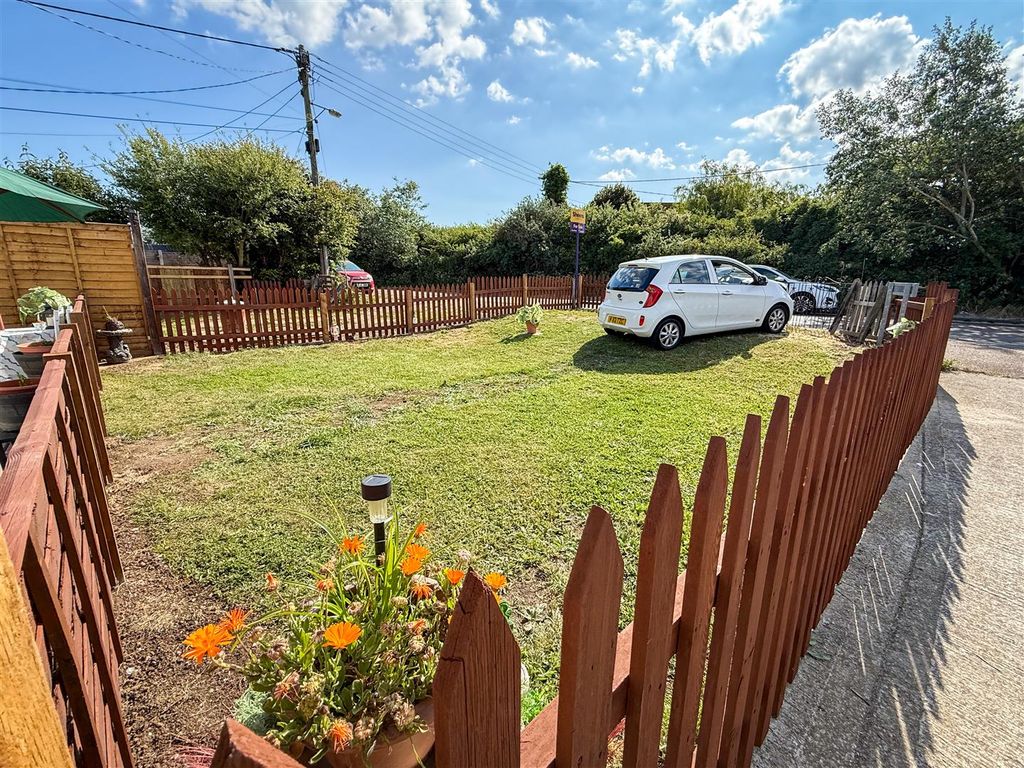 Property photo 2 of 14 Alternate View Of Front Garden Area