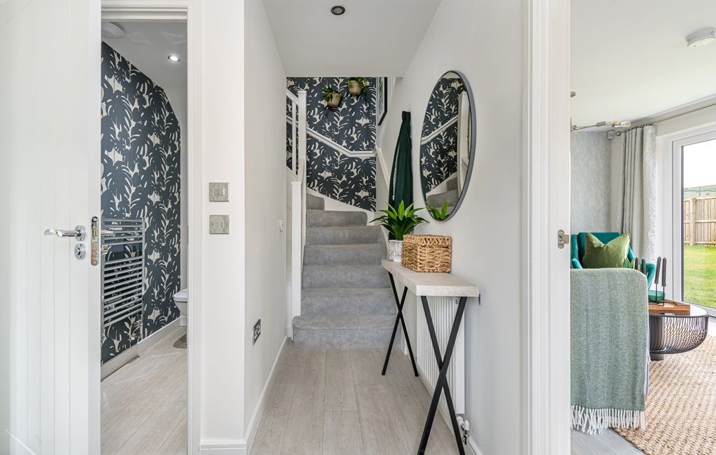 Property photo 2 of 13 The Boswell Home Has A Bright Welcoming Hallway