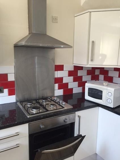 Property photo 2 of 14 A Modern Kitchen Area Featuring A Stainless Steel ...