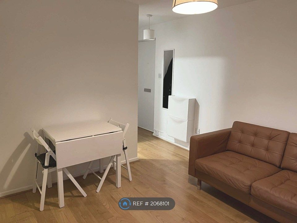 Property photo 3 of 26 Living Area With Front Entrance View