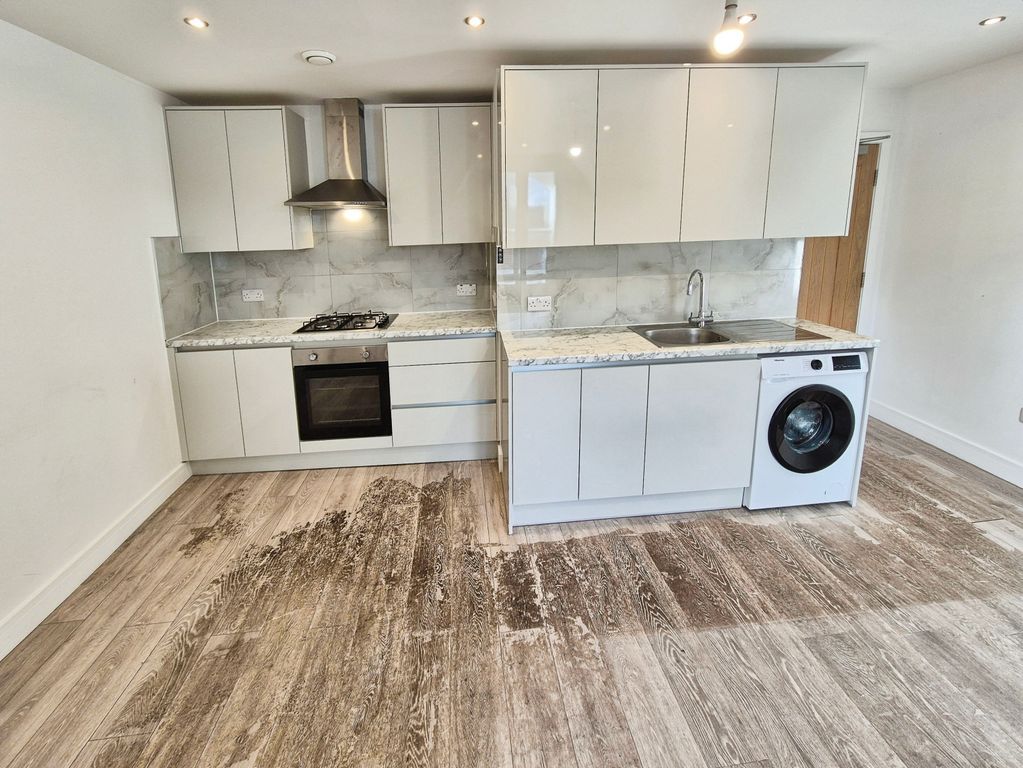 Property photo 3 of 9 Kitchen Area