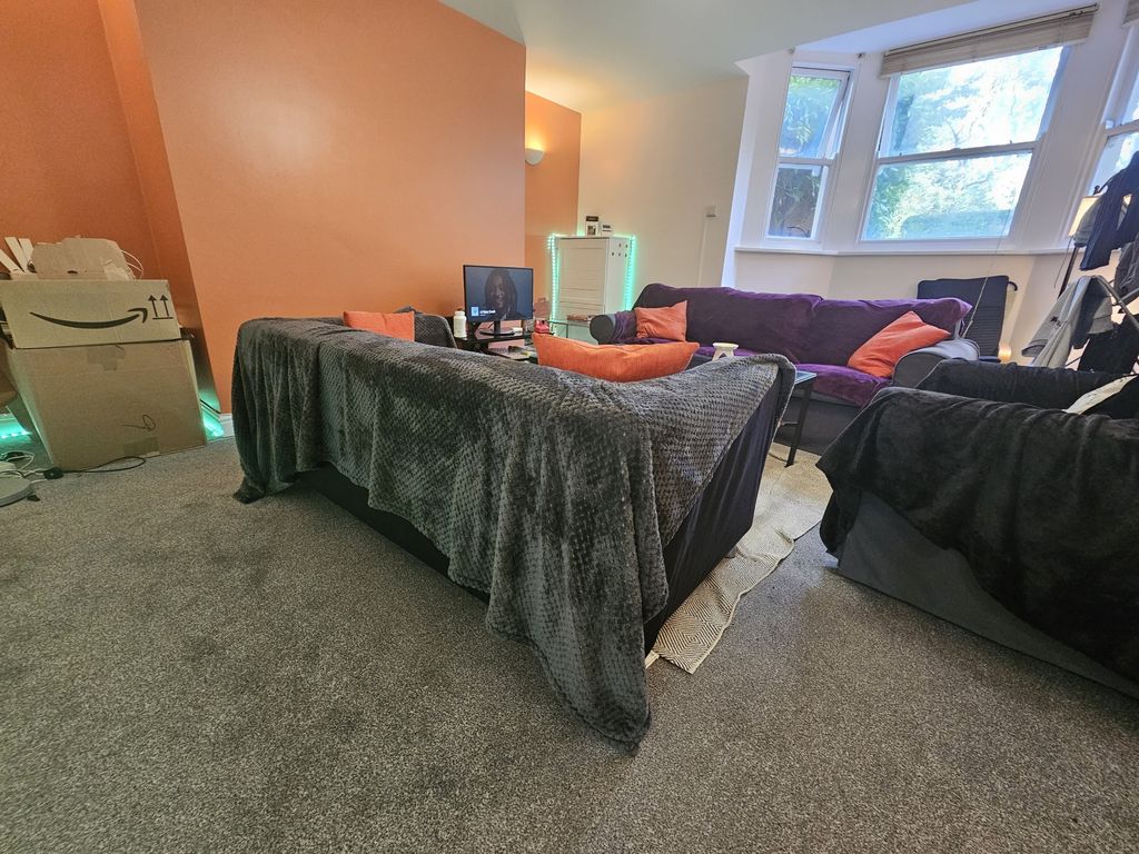 Property photo 3 of 10 A Spacious Double Bedroom Featuring A Large Bed, A...