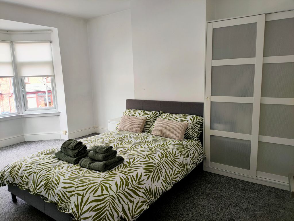 Property photo 3 of 8 Front Bedroom