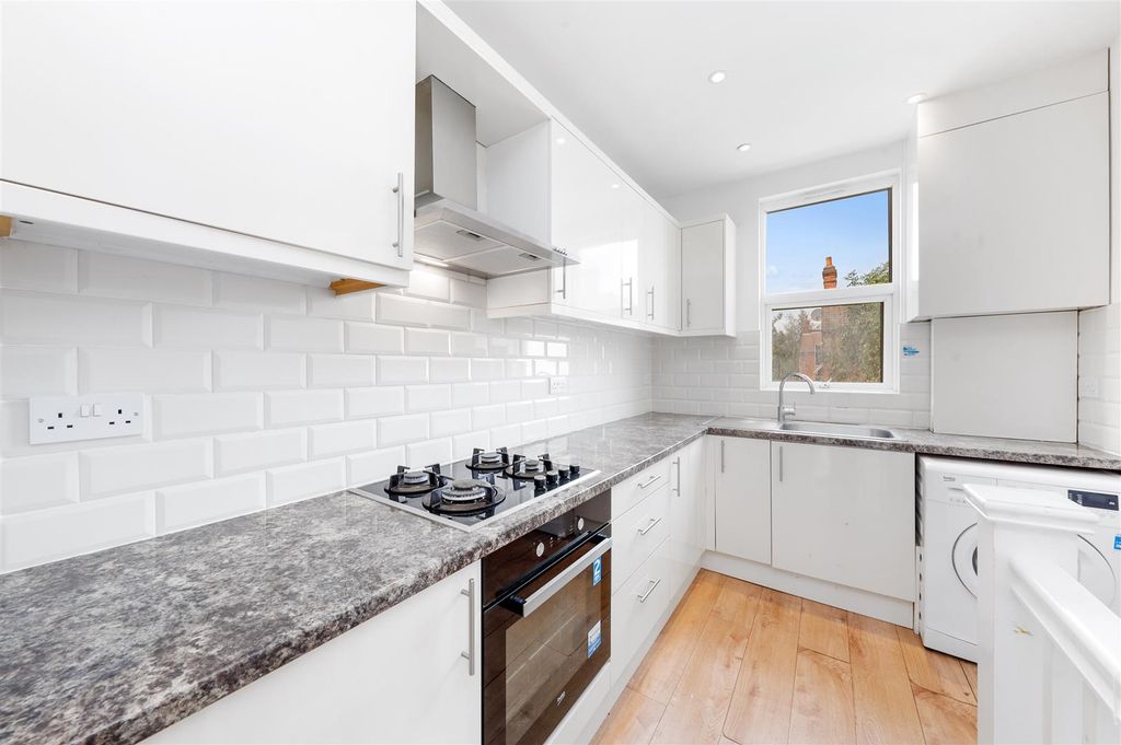 Property photo 3 of 12 Kitchen