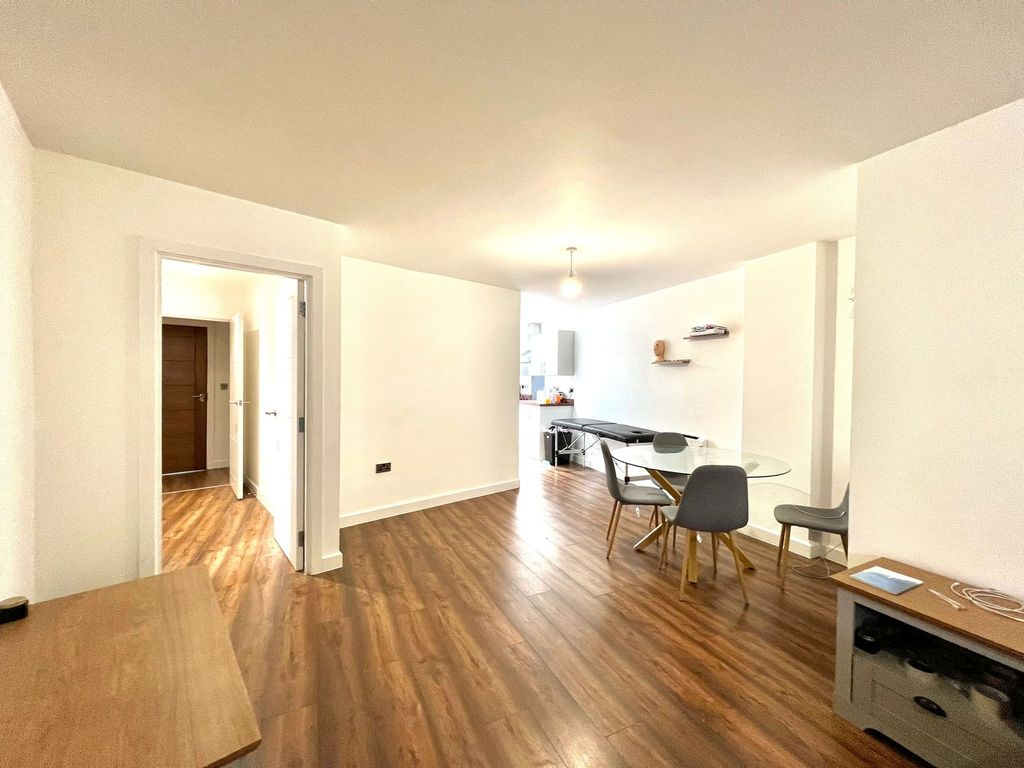 Property photo 1 of 7 Living Area