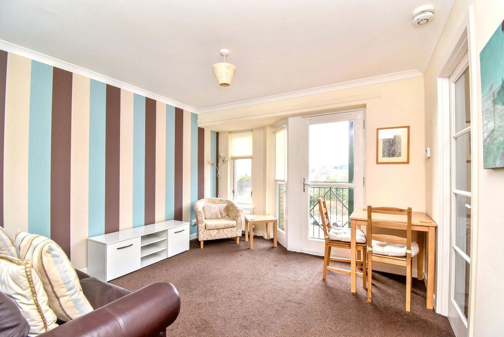 Property photo 2 of 9 Lounge/Dining Angle 1