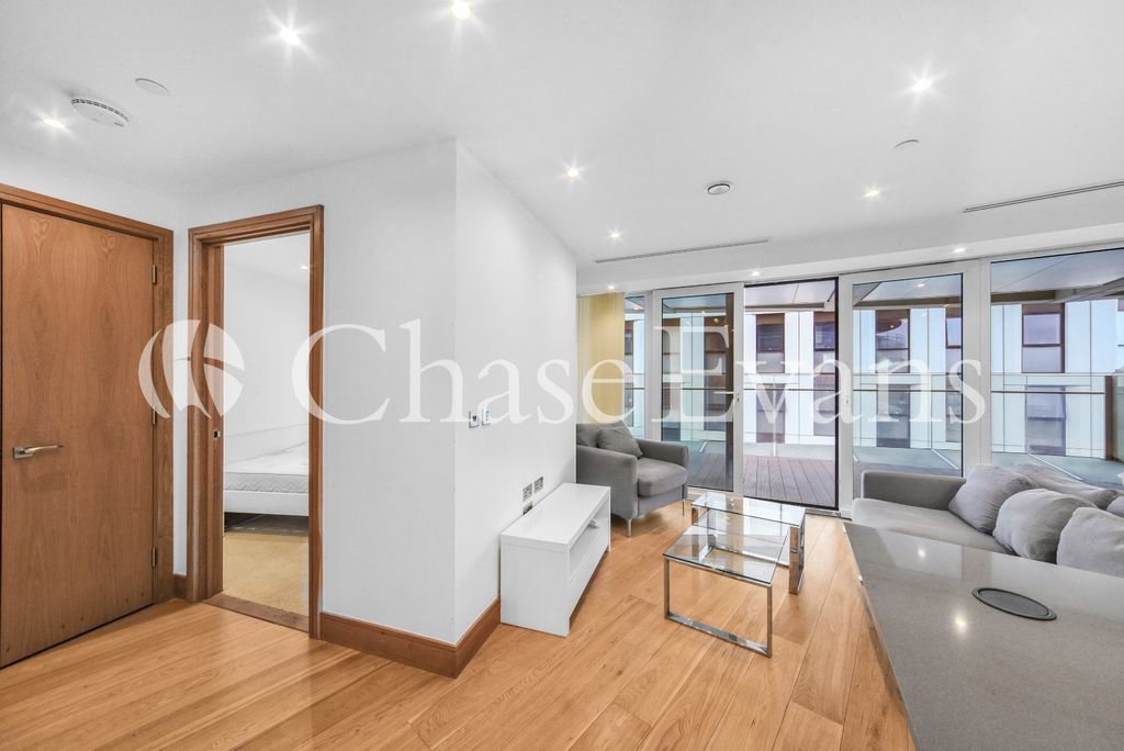 Property photo 3 of 12 Living Area