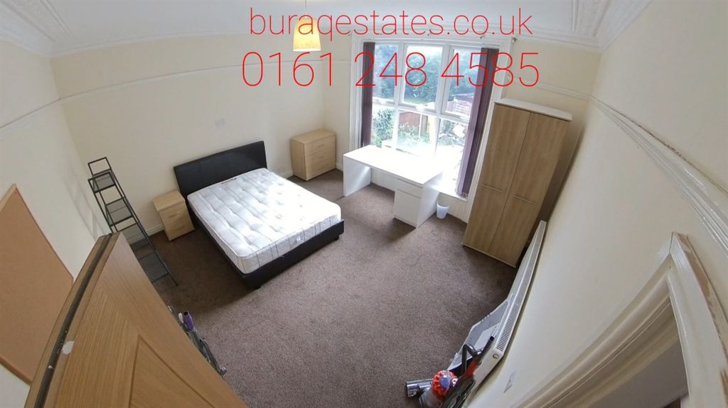 Property photo 2 of 15 Bright And Spacious Master Bedroom Featuring A Lar...