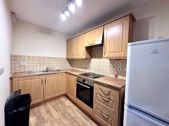 Property photo 3 of 9 Kitchen