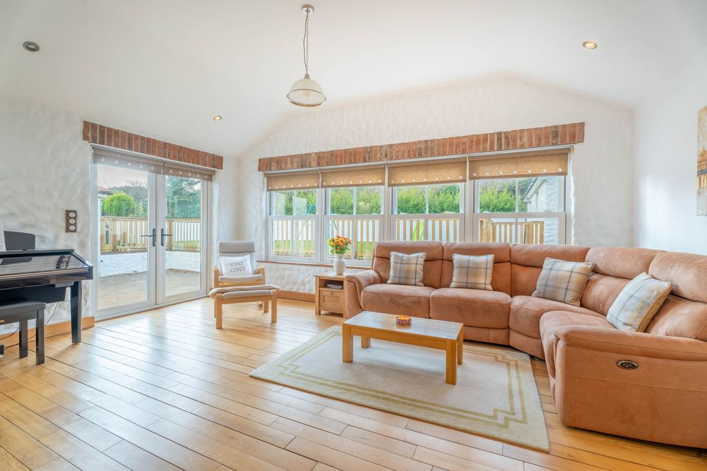Property photo 3 of 42 South Facing Sun Room