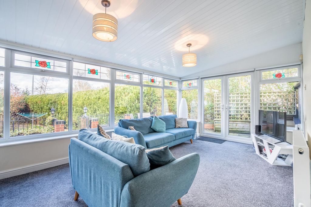 Property photo 2 of 13 Conservatory