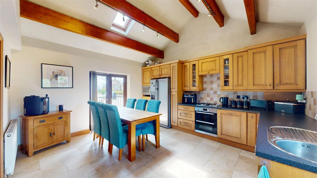 Property photo 2 of 14 Dining Kitchen