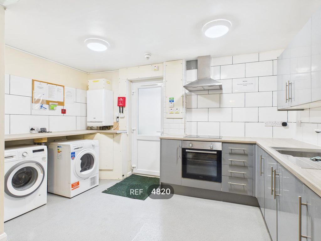 Property photo 3 of 12 Kitchen / Living Area