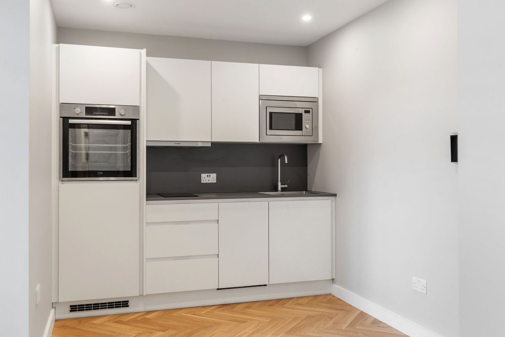 Property photo 2 of 12 Kitchen