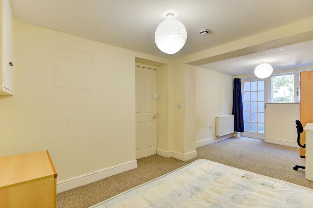 Property photo 1 of 27 A Bright And Welcoming Living Room With Natural li...