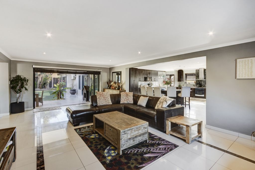 Property photo 2 of 68 Family TV Room Walking Out Onto The Entertainment Area Outside