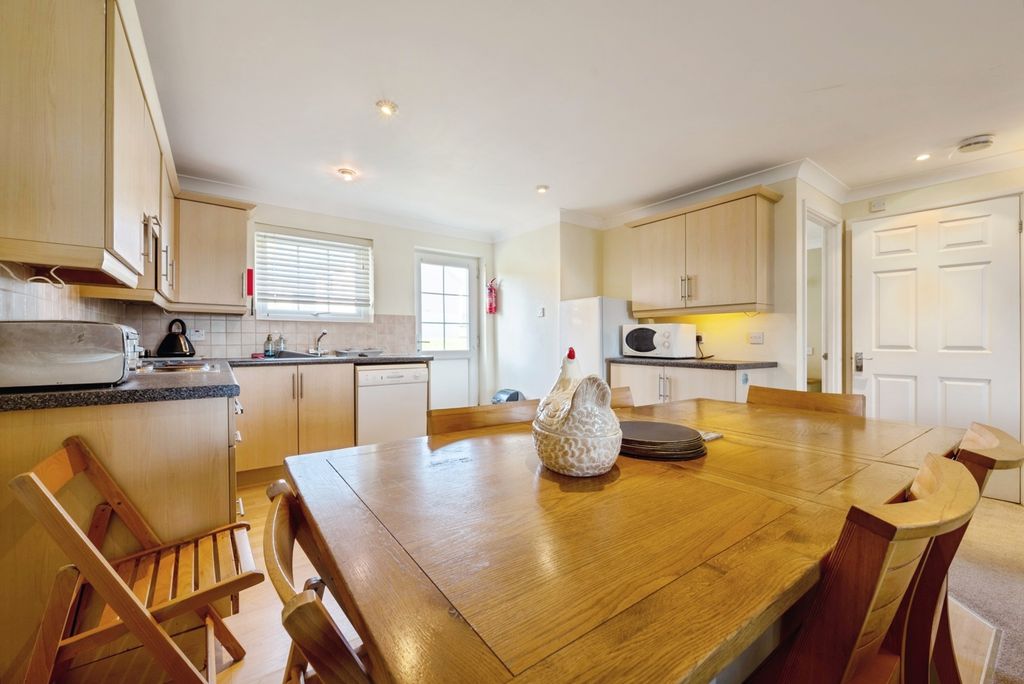 Property photo 3 of 32 Kitchen Area