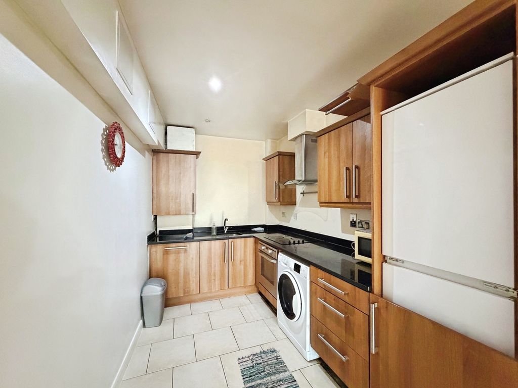Property photo 3 of 9 Kitchen