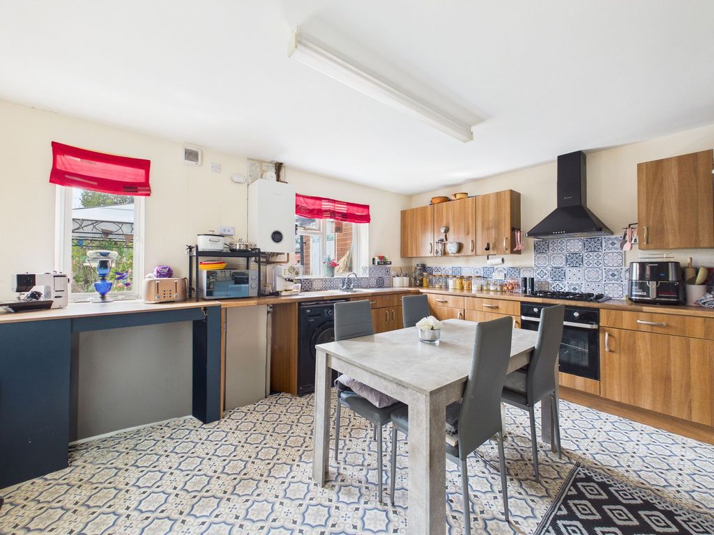 Property photo 3 of 12 Dining Kitchen