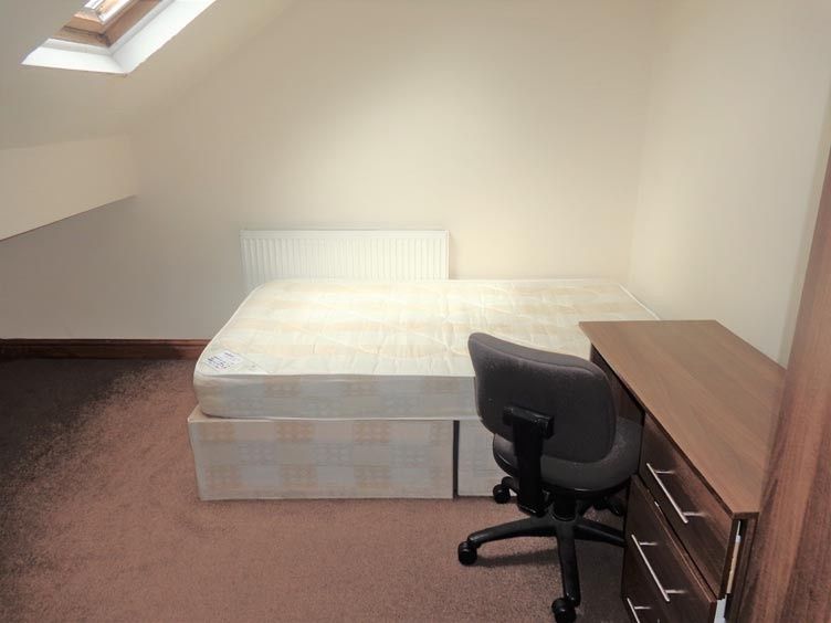 Property photo 1 of 22 A Bright And Tidy Living Room Featuring Ample Natu...