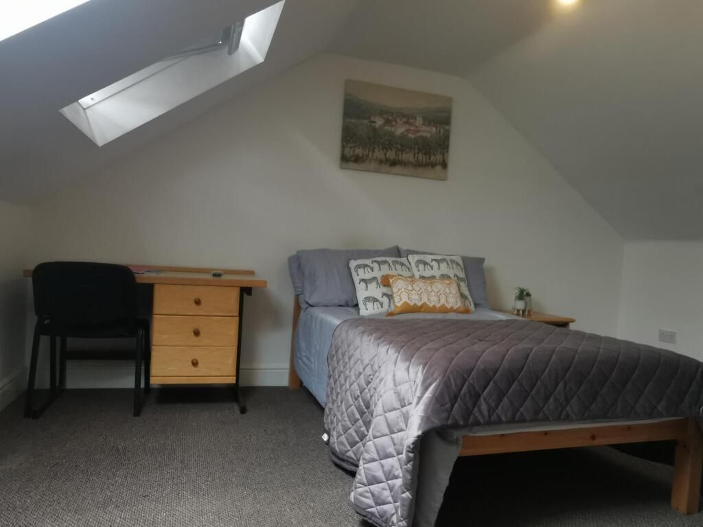 Property photo 3 of 7 Bright Attic Bedroom With Desk And Skylight...