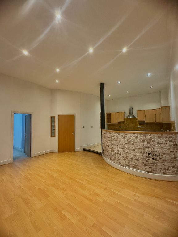 Property photo 3 of 9 Living Area