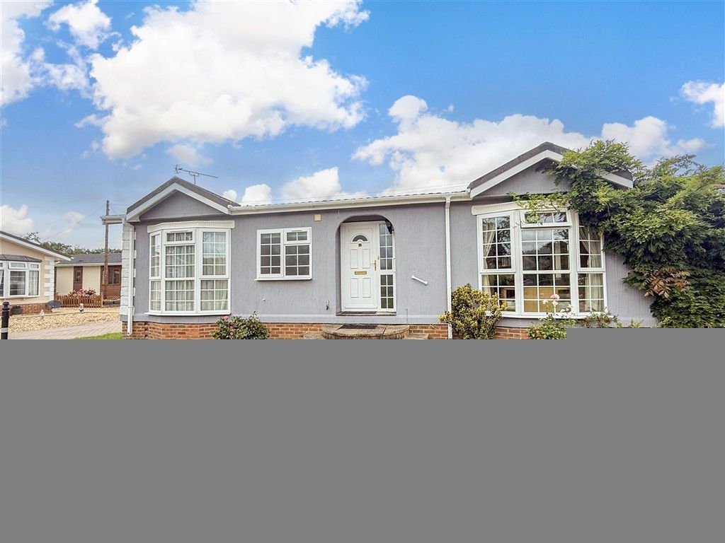 Property photo 3 of 12 Front