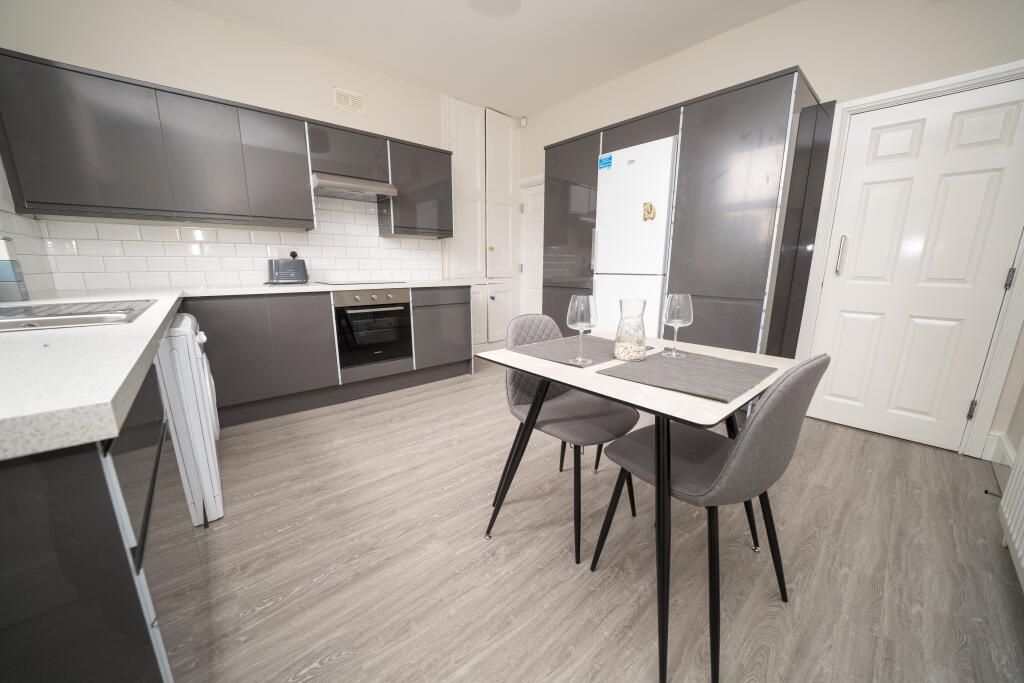 Property photo 1 of 10 A Modern And Well-Maintained Kitchen Featuring Sle...