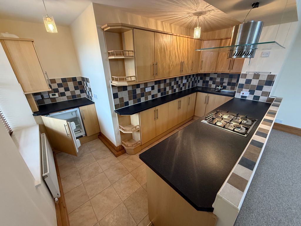 Property photo 2 of 12 Kitchen