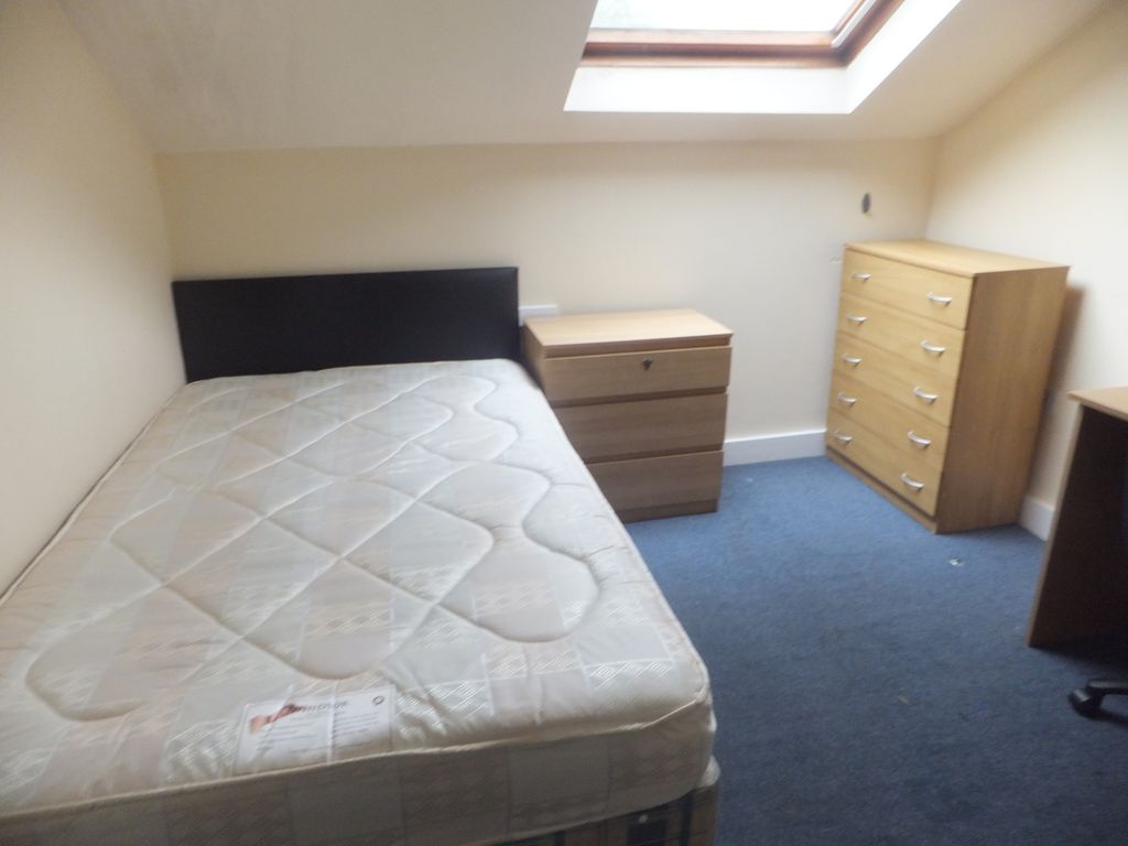Property photo 2 of 26 A Cozy Bedroom Featuring A Comfortable Double Bed,...