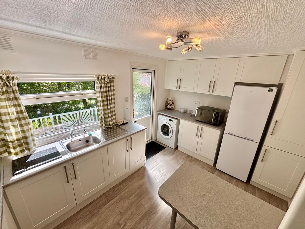 Property photo 3 of 16 Kitchen
