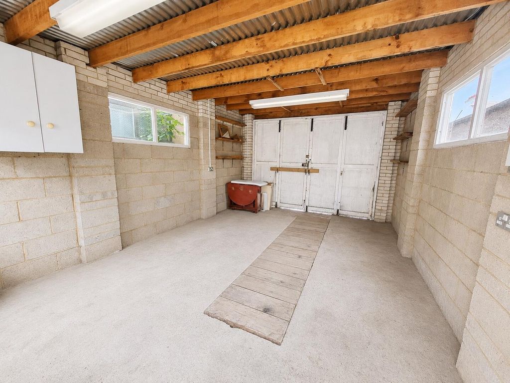 Property photo 2 of 13 Garage