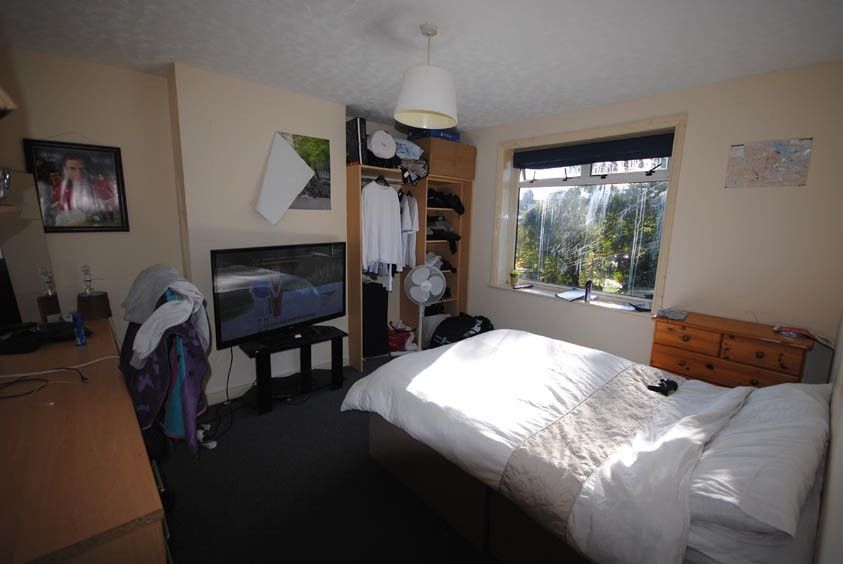 Property photo 1 of 5 A Bright And Welcoming Bedroom Featuring A Comfort...