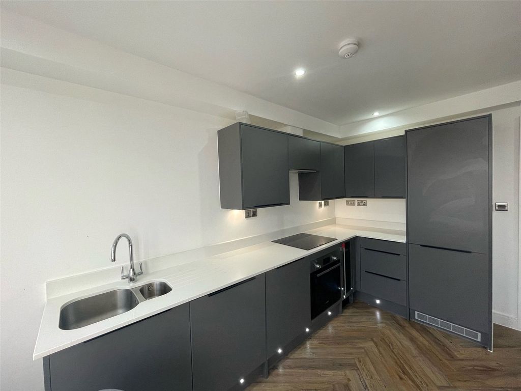 Property photo 3 of 12 Kitchen