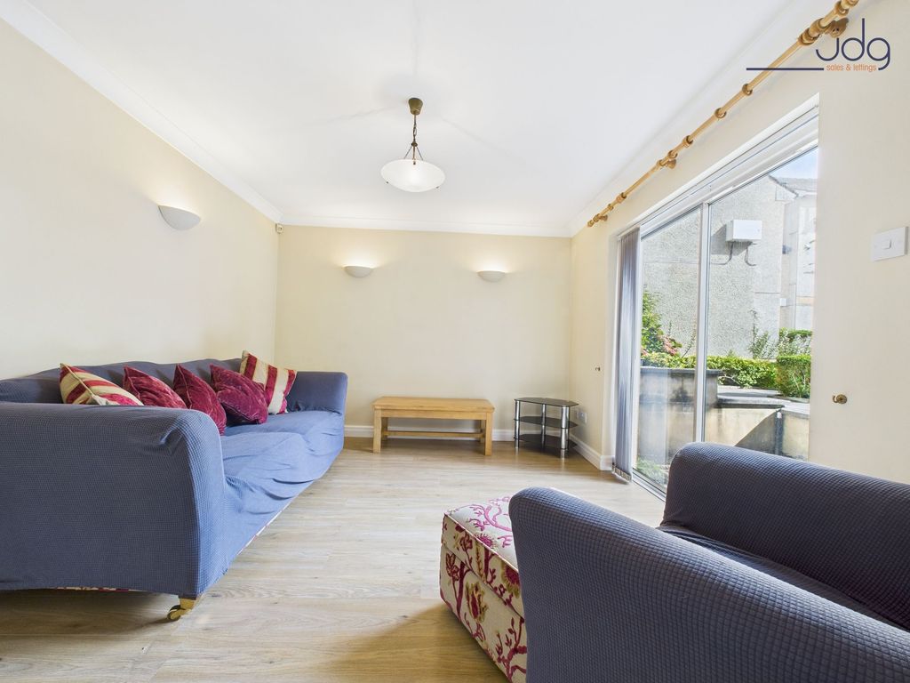 Property photo 3 of 8 Living Room With Sliding Door Outdoor Access