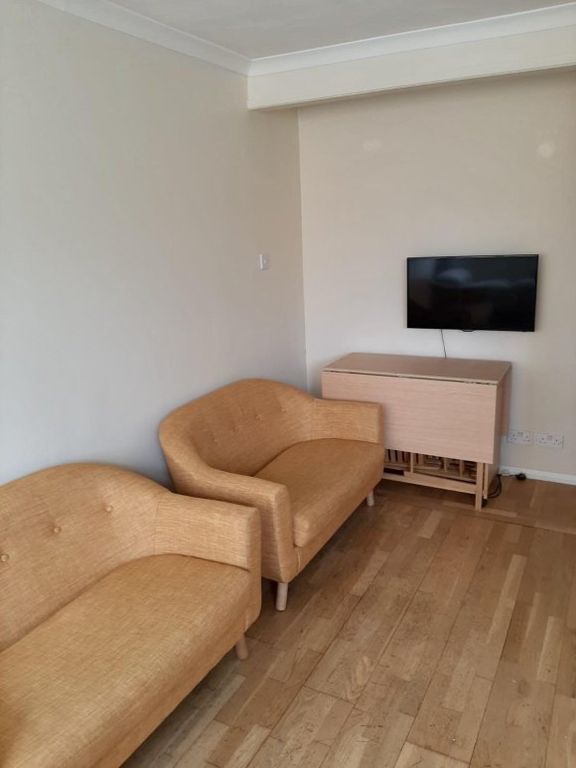 Property photo 1 of 11 Living Area