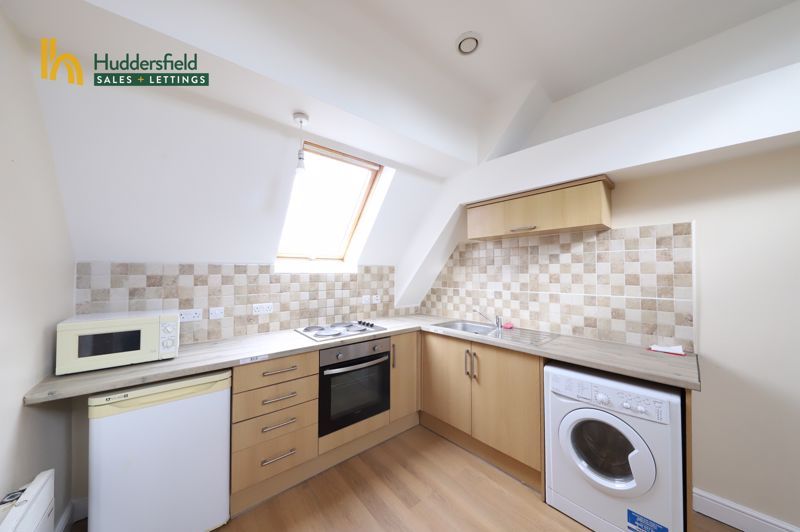 Property photo 3 of 8 Kitchen