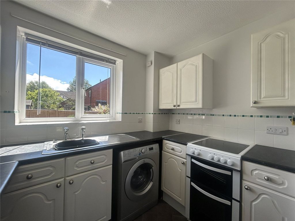 Property photo 2 of 12 Kitchen