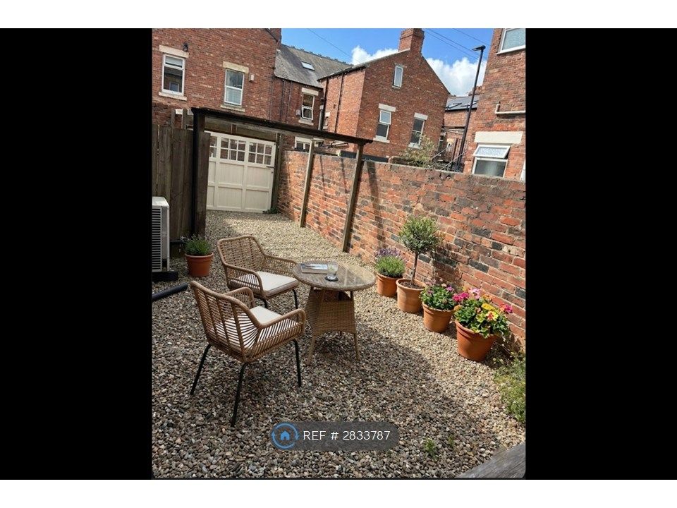 Property photo 3 of 10 Rear Parking/Patio