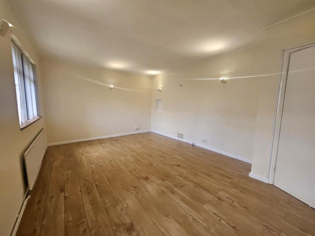 Property photo 3 of 7 Front Room.Jpg