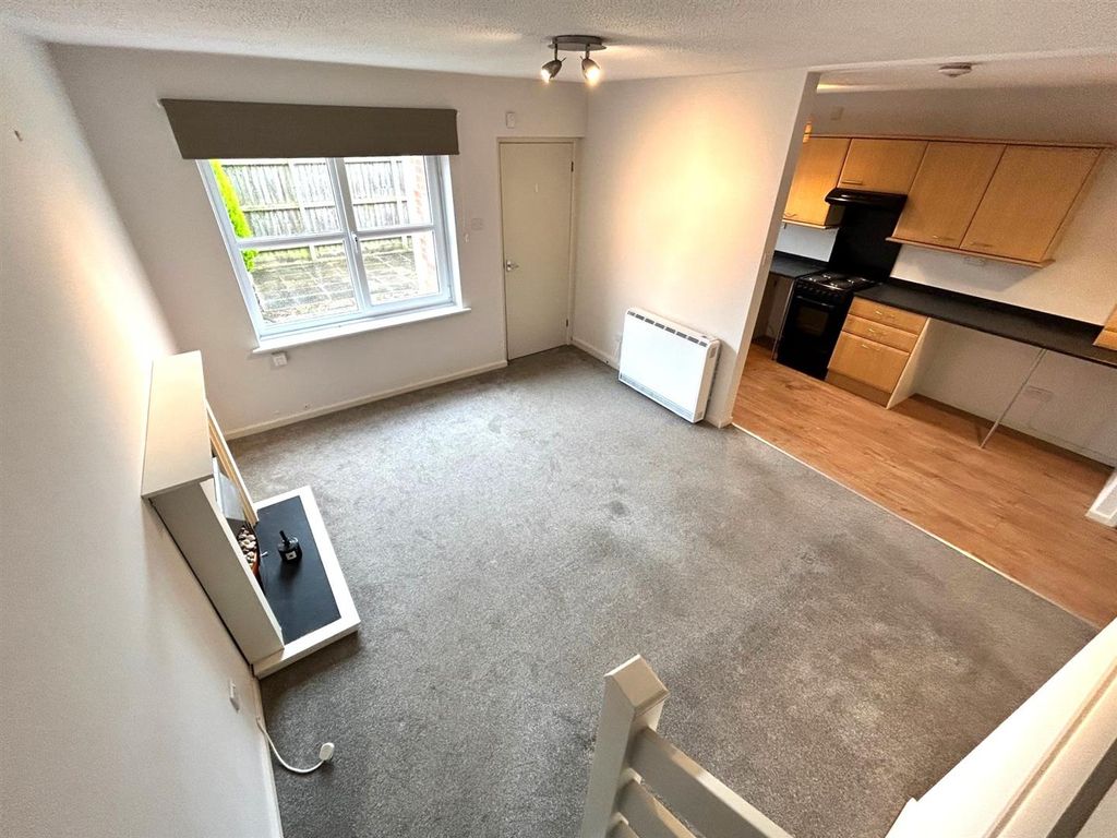 Property photo 3 of 12 Living Area