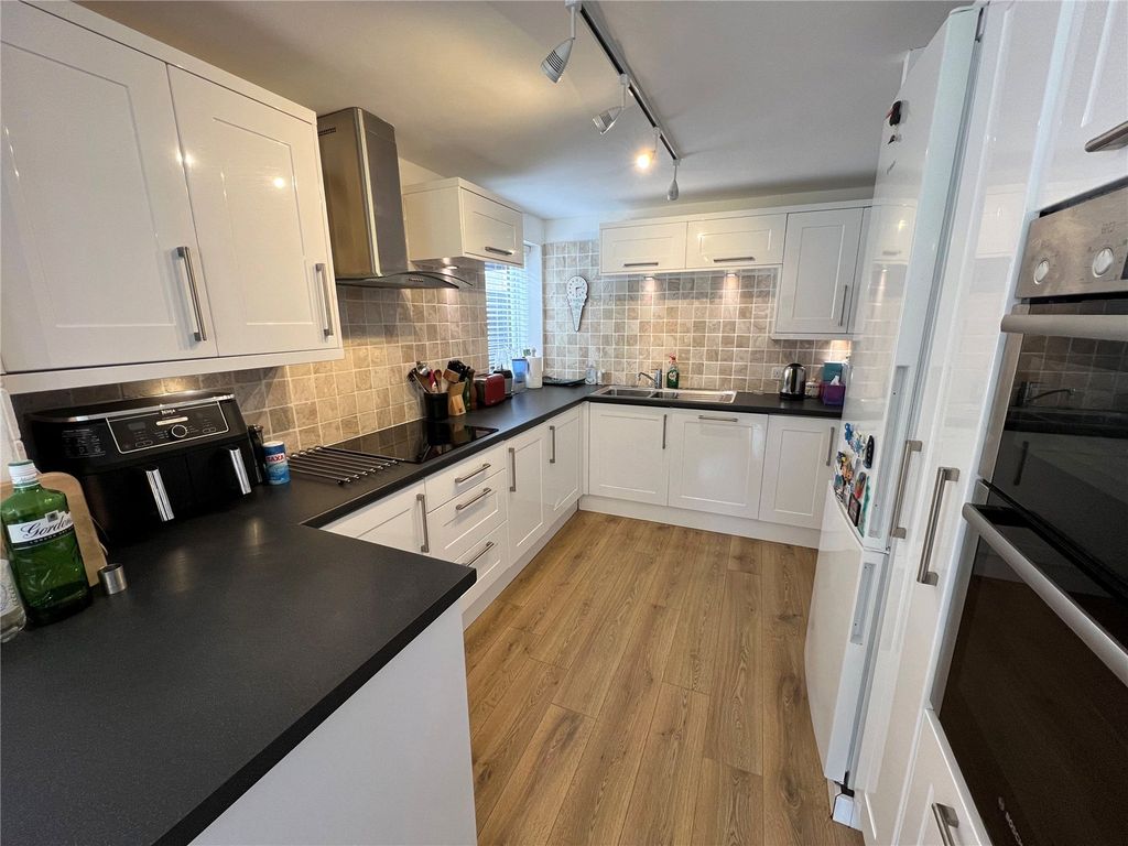 Property photo 2 of 13 Kitchen Area