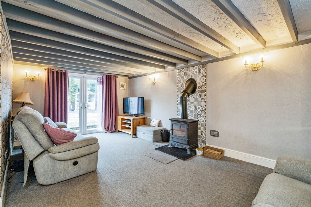 Property photo 3 of 20 Lounge With Log Burner