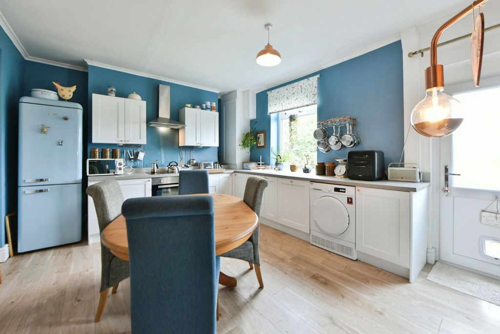 Property photo 1 of 12 Dining Kitchen