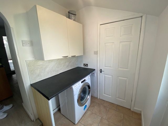 Property photo 2 of 11 Utility Room