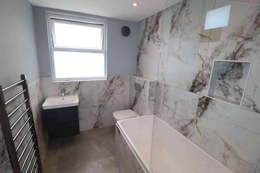 Property photo 3 of 11 New Bathroom