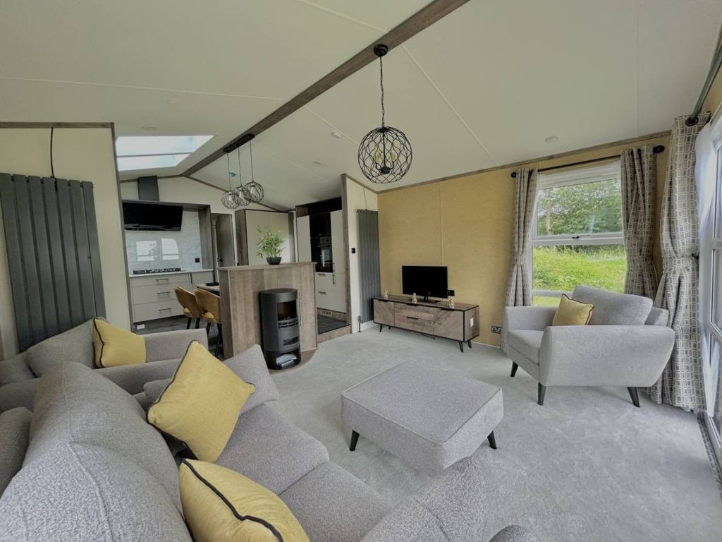 Property photo 2 of 8 Living..