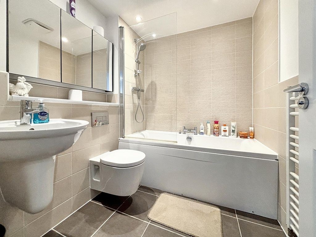 Property photo 3 of 14 Modern Bathroom With A Bathtub And Overhead Shower...